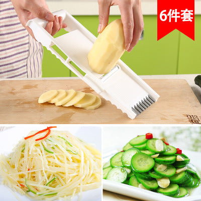 Kitchen multifunctional vegetable cutter/peeling/gratering/slicing/garlic grinder